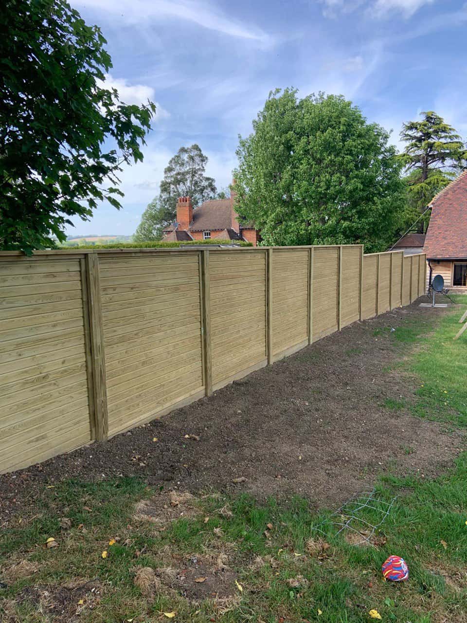This is a photo of an acoustic fence installed by Fast Fix Fencing Chatteris